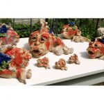 works of pottery-human-face-fishes