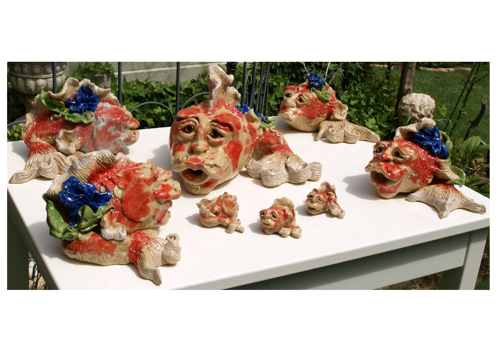 glazed human face fishes series, works of pottery